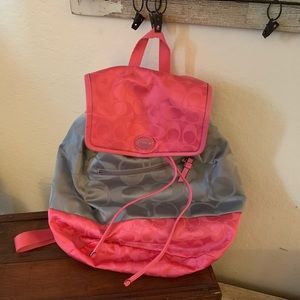 Coach small backpack with a lot of room inside.